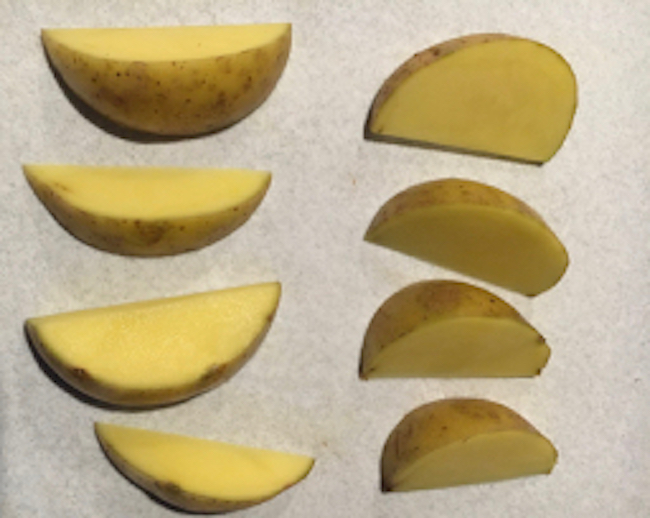 Cutting Yukon gold potato to wedges