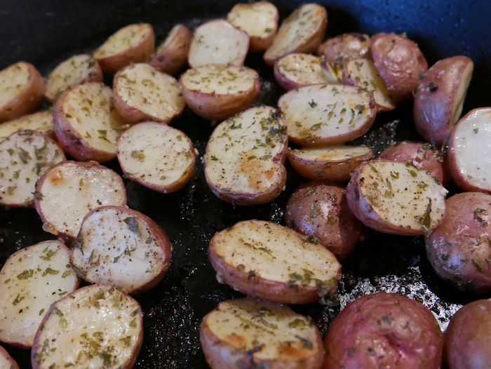 Taste testing the herbed potatoes